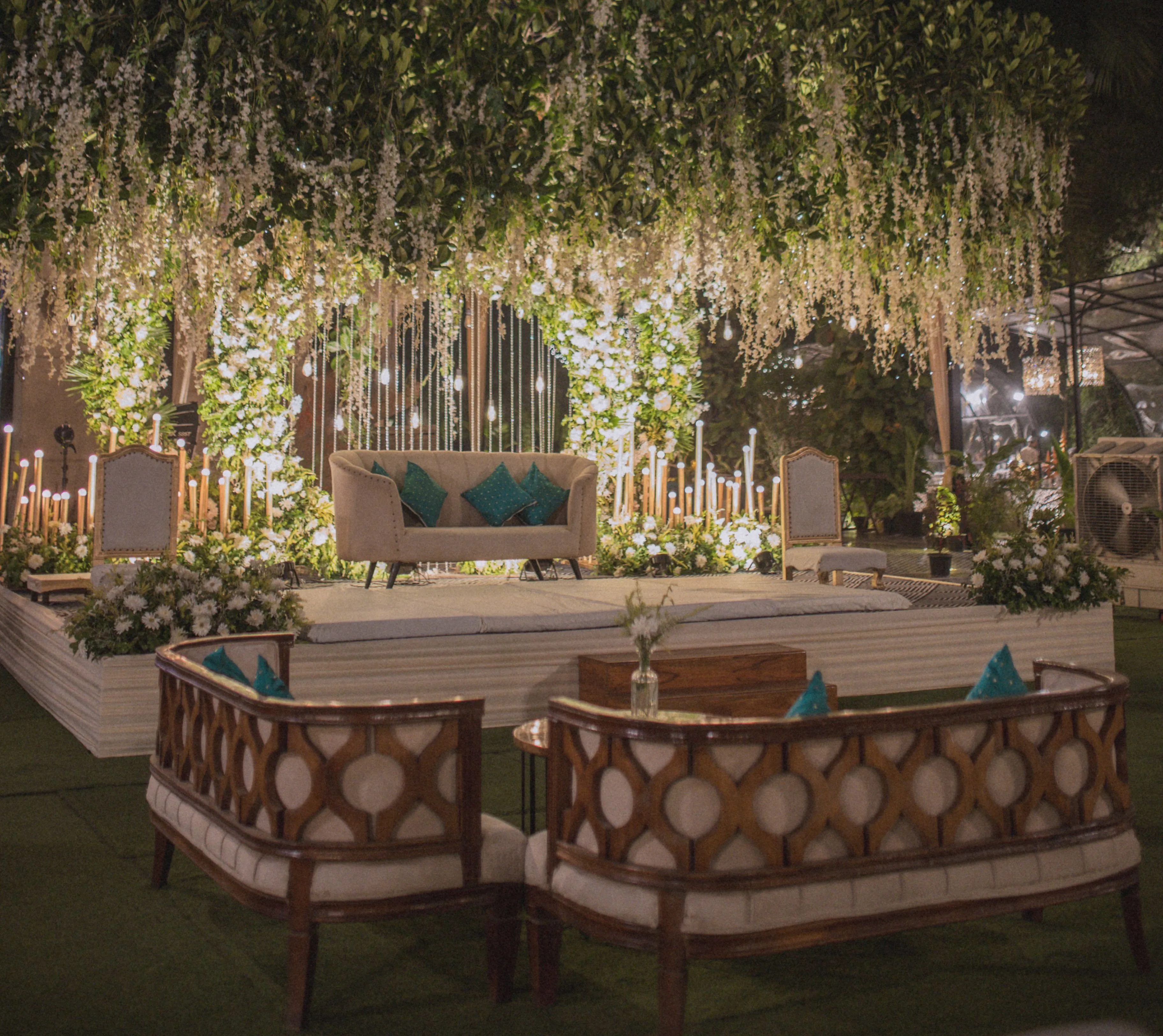 Scenic luxury wedding stage under a tree at a Jim Corbett venue